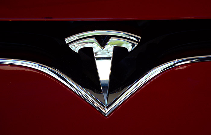 Tesla во II кв. получила рекордную выручку, сократив чистую прибыль почти вдвое